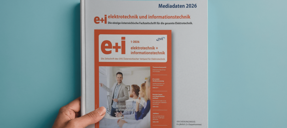 Hand hält ein Buch mit den Mediadaten der e+i