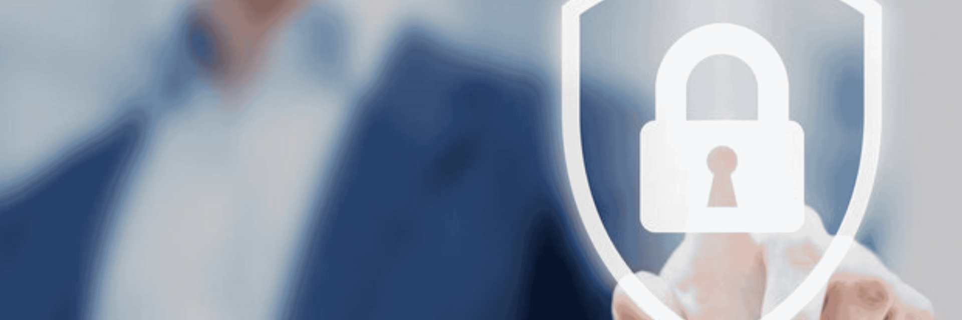 Cyber Security_Bannerbild.png Person im Hintergrund zeigt mit Finger auf ein digitales Symbol, ein Schild mit Vorhängeschloss in der Mitte