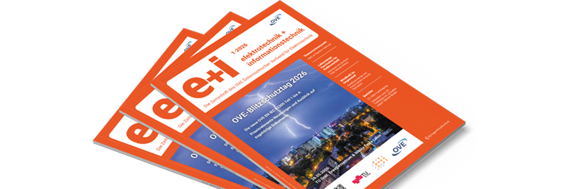 Drei Magazine mit dem Titel "e+i" und einer Stadtansicht bei Gewitter.